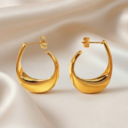 Minimalist-style oval-shaped metal cut-out earrings